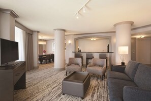 Presidential Suite, 1 King Bed | Living area | 49-inch flat-screen TV with satellite channels, TV, pay films - Embassy Suites by Hilton Atlanta at Centennial Olympic Park (Atlanta)
