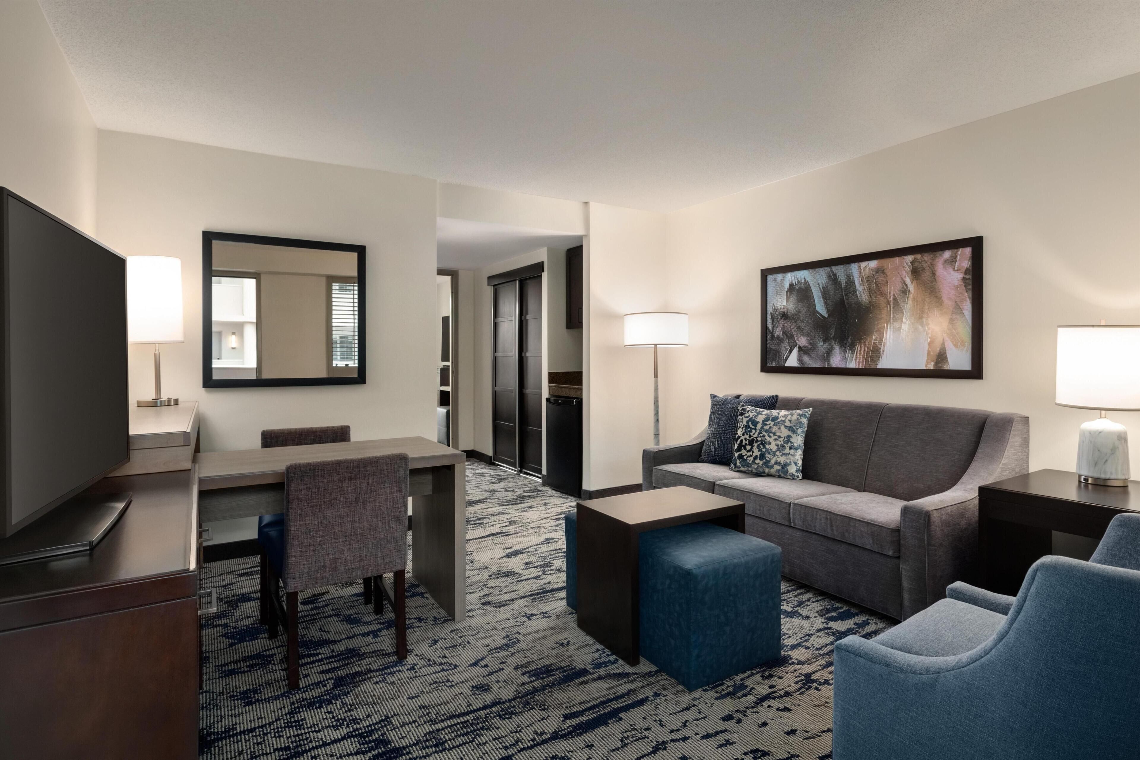 Parkview Suite-King-Non Smoking | Living area | 49-inch flat-screen TV with satellite channels, TV, pay films