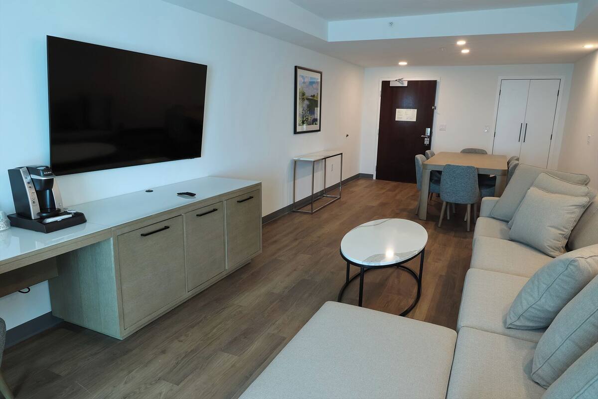 50-inch flat-screen TV with satellite channels, pay movies
