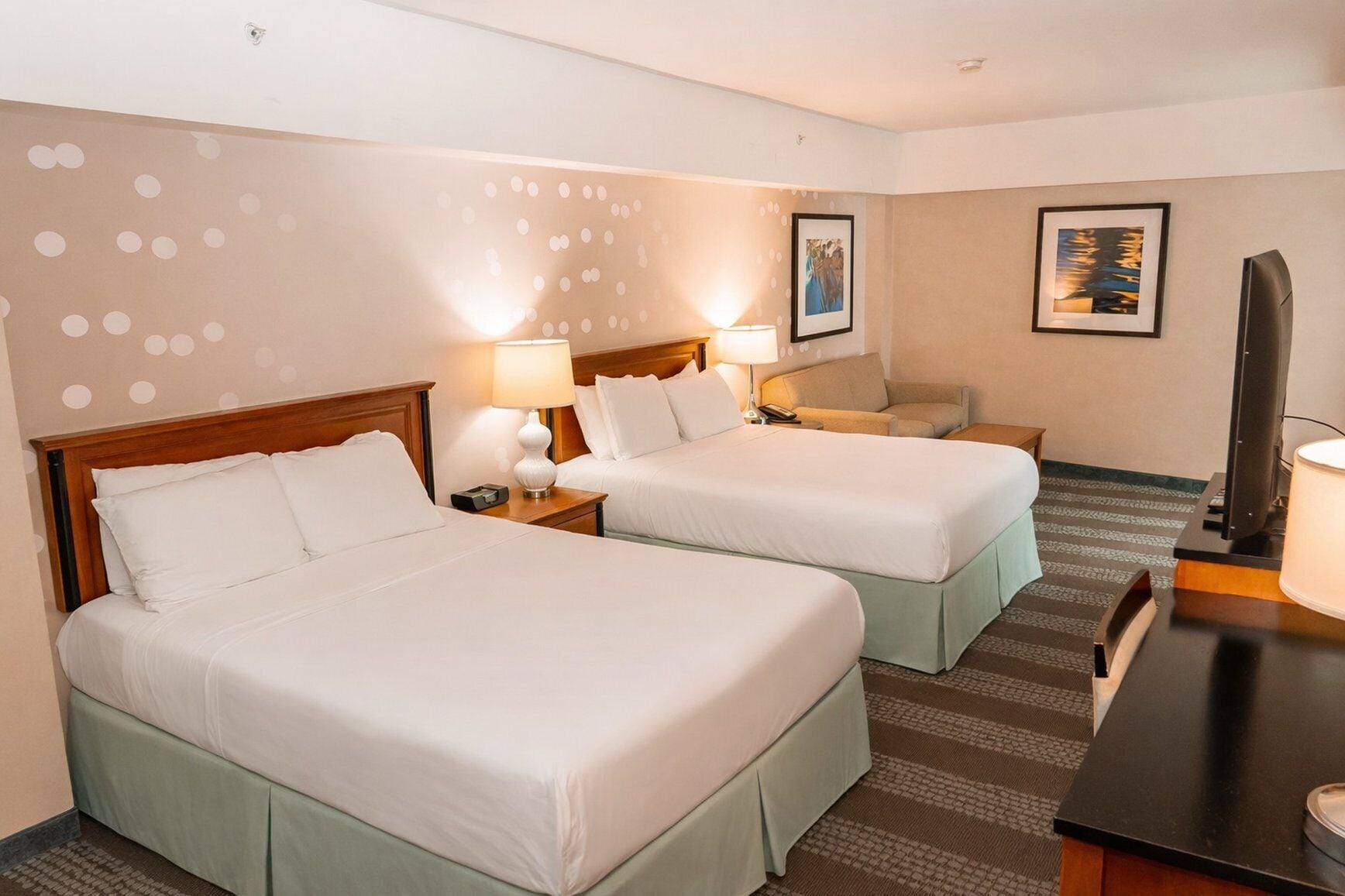 Desk, blackout drapes, iron/ironing board, free cribs/infant beds