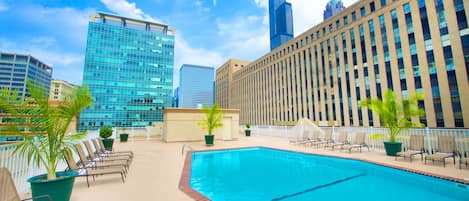 Seasonal outdoor pool, open 8:00 AM to 10:00 PM, sun loungers