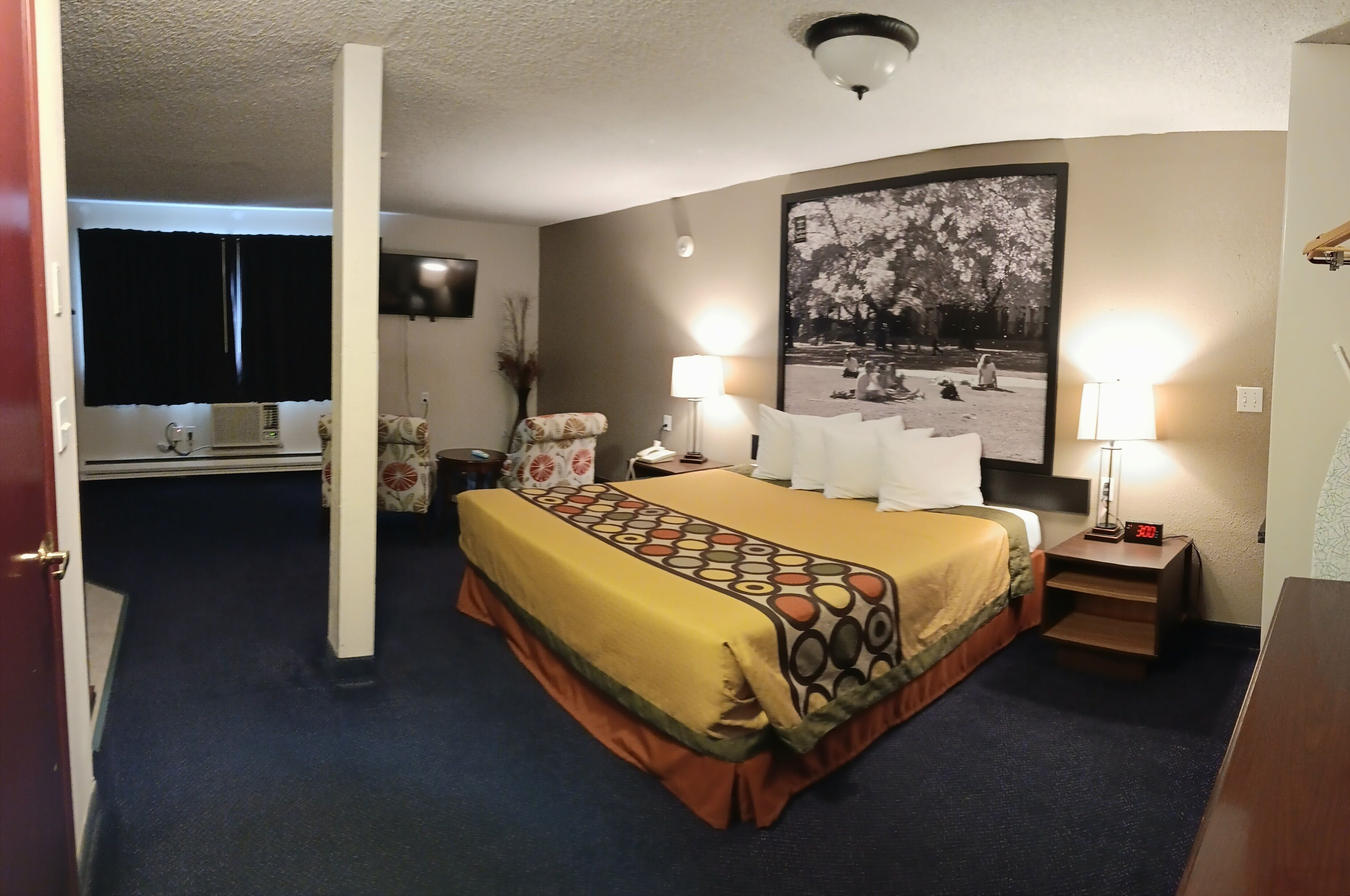 desk, laptop workspace, blackout curtains, iron/ironing board