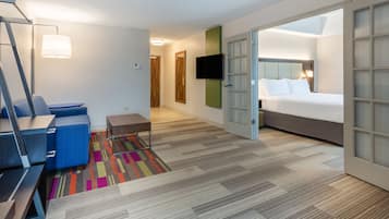 Suite, 1 King Bed | In-room safe, desk, iron/ironing board, free cribs/infant beds