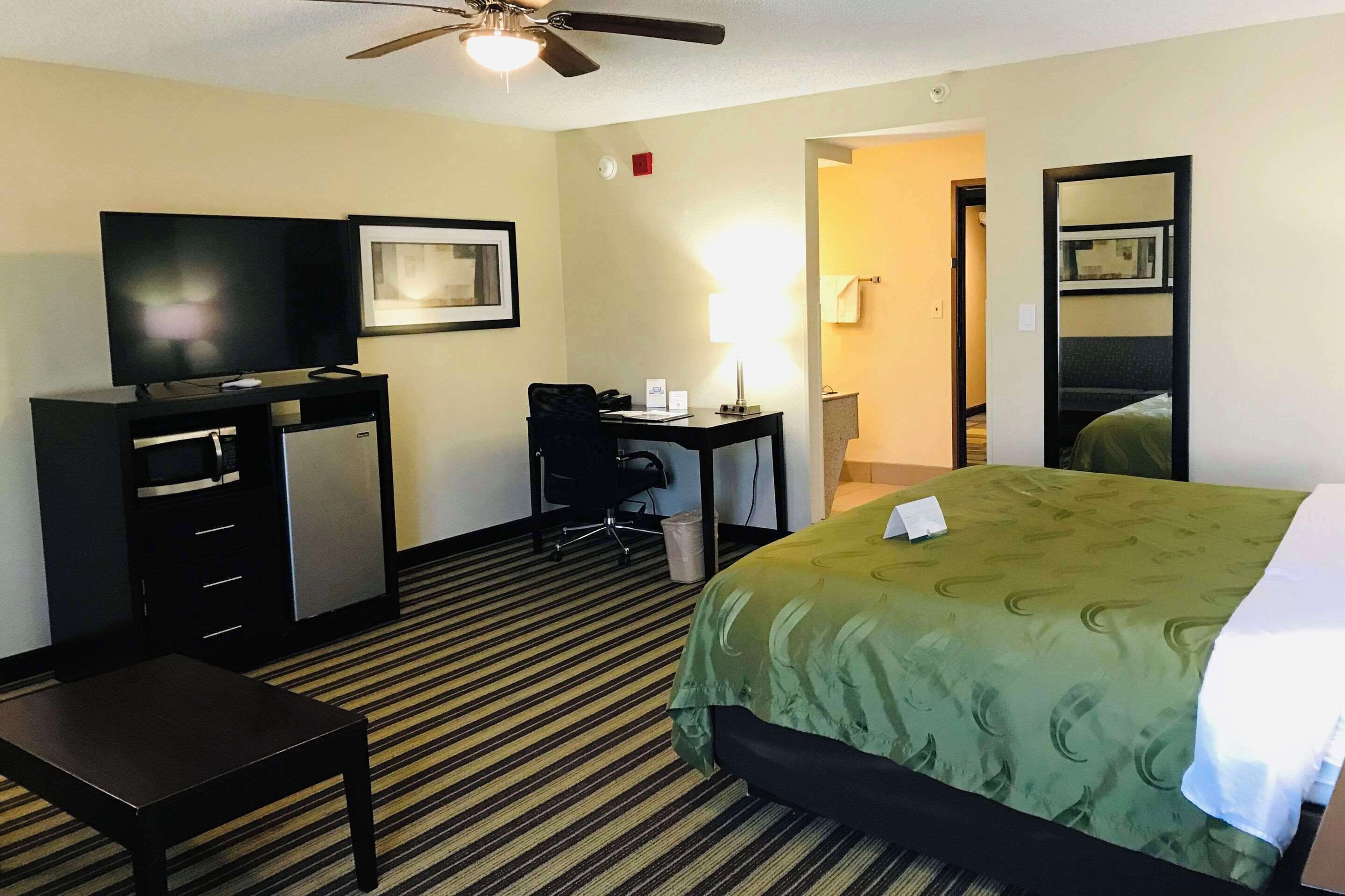 Suite, 1 King Bed, Non Smoking | Premium bedding, desk, iron/ironing board, free cribs/infant beds