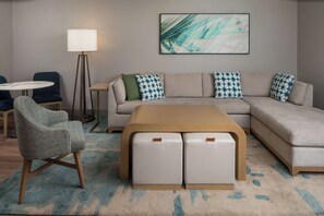 One Bedroom Suite, One King Bed | Living area | Flat-screen TV, pay films - Hilton Garden Inn Orlando Airport (Orlando)