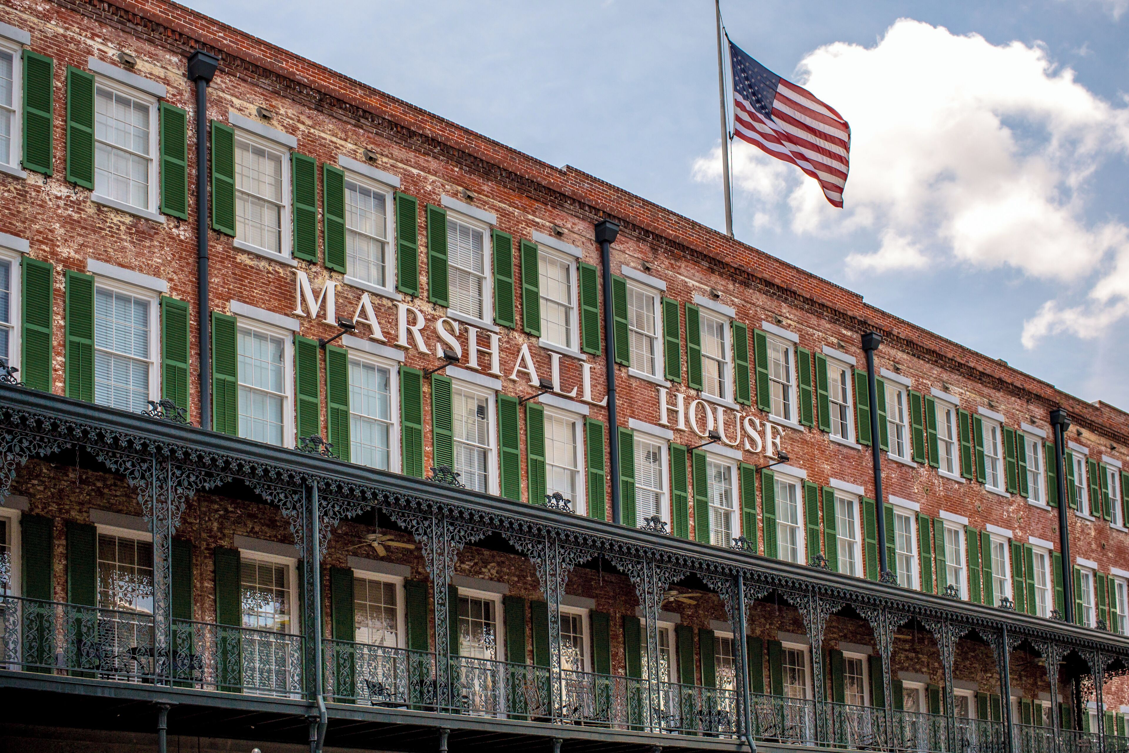 A historic building with the name "MARSHALL HOUSE" prominently displayed.