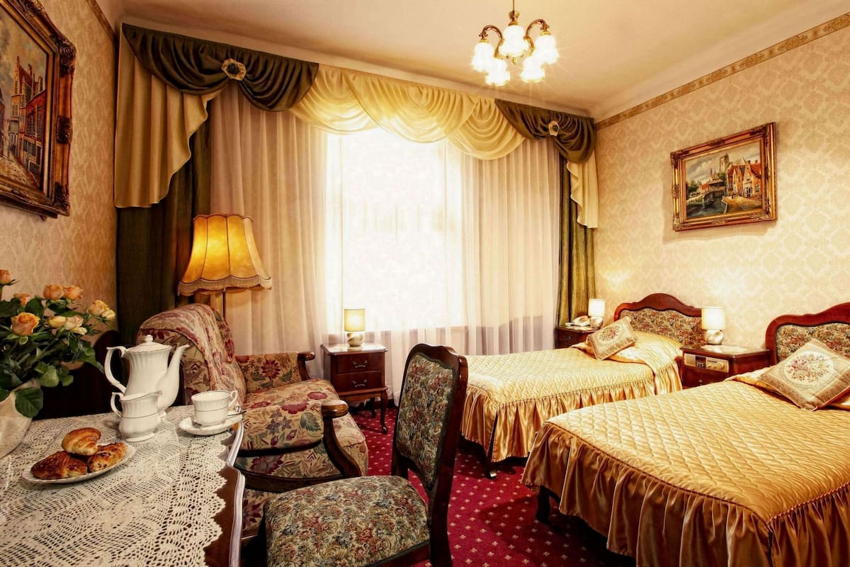 Comfort-Doppel- oder -Zweibettzimmer