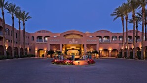 A Marriott hotel with a central courtyard, palm trees, and a fountain. - Scottsdale Marriott at McDowell Mountains (Scottsdale)
