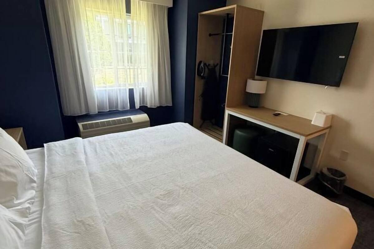 Desk, iron/ironing board, cribs (free), WiFi (free)