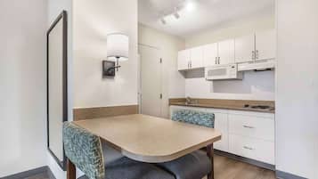 Full-sized fridge, microwave, stovetop, coffee/tea maker