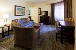 Premium bedding, desk, laptop workspace, iron/ironing board