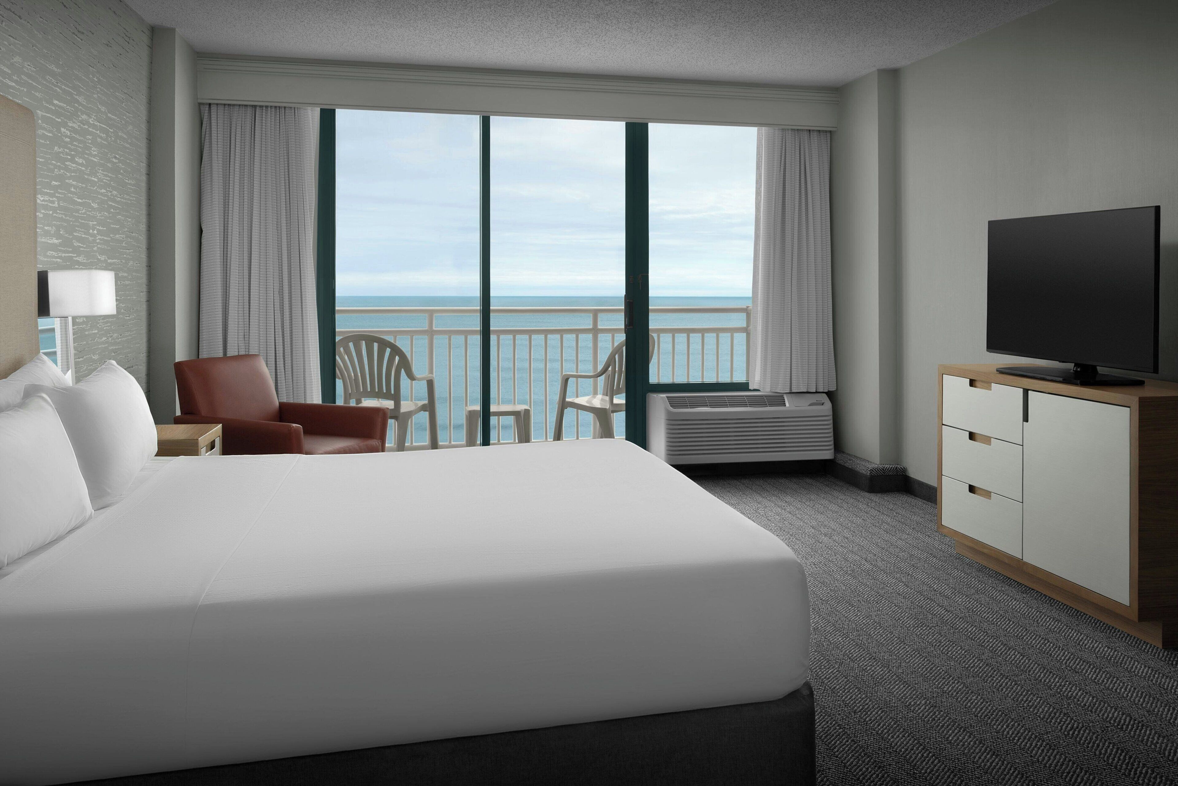 suite, 1 bedroom, oceanfront | premium bedding, desk, iron/ironing board, free cots/infant beds