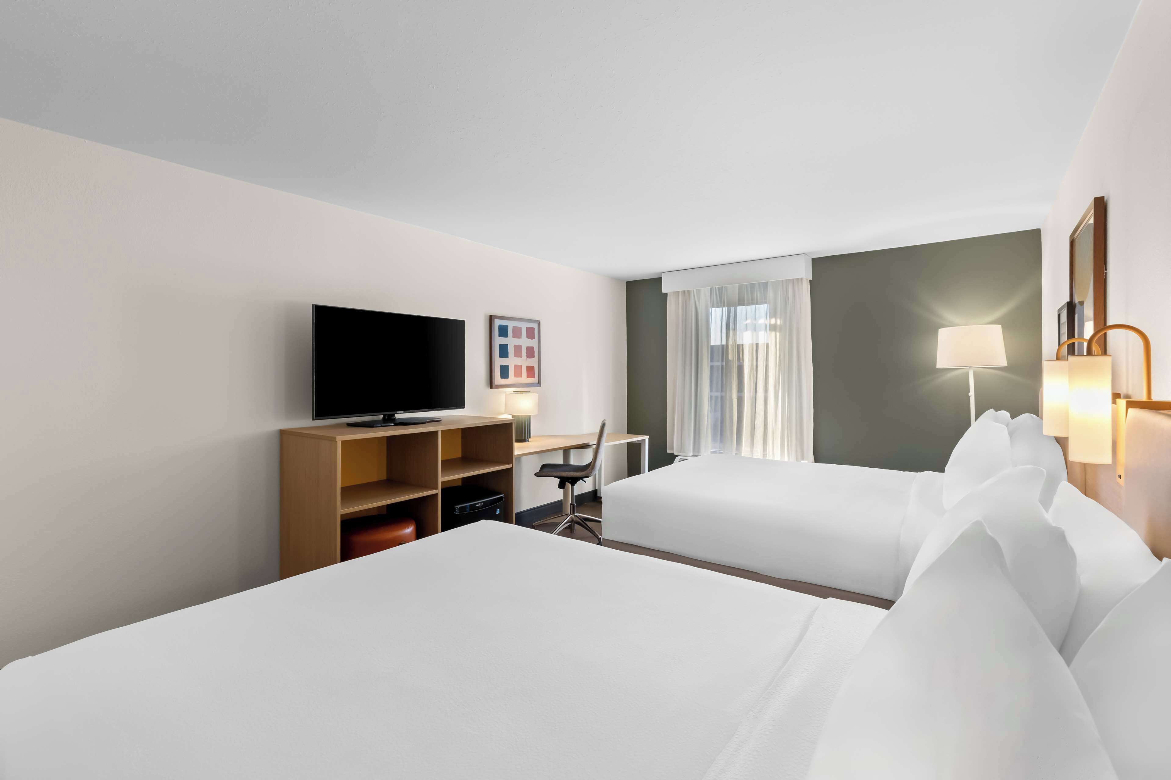 room, 2 queen beds | desk, laptop workspace, blackout curtains, iron/ironing board