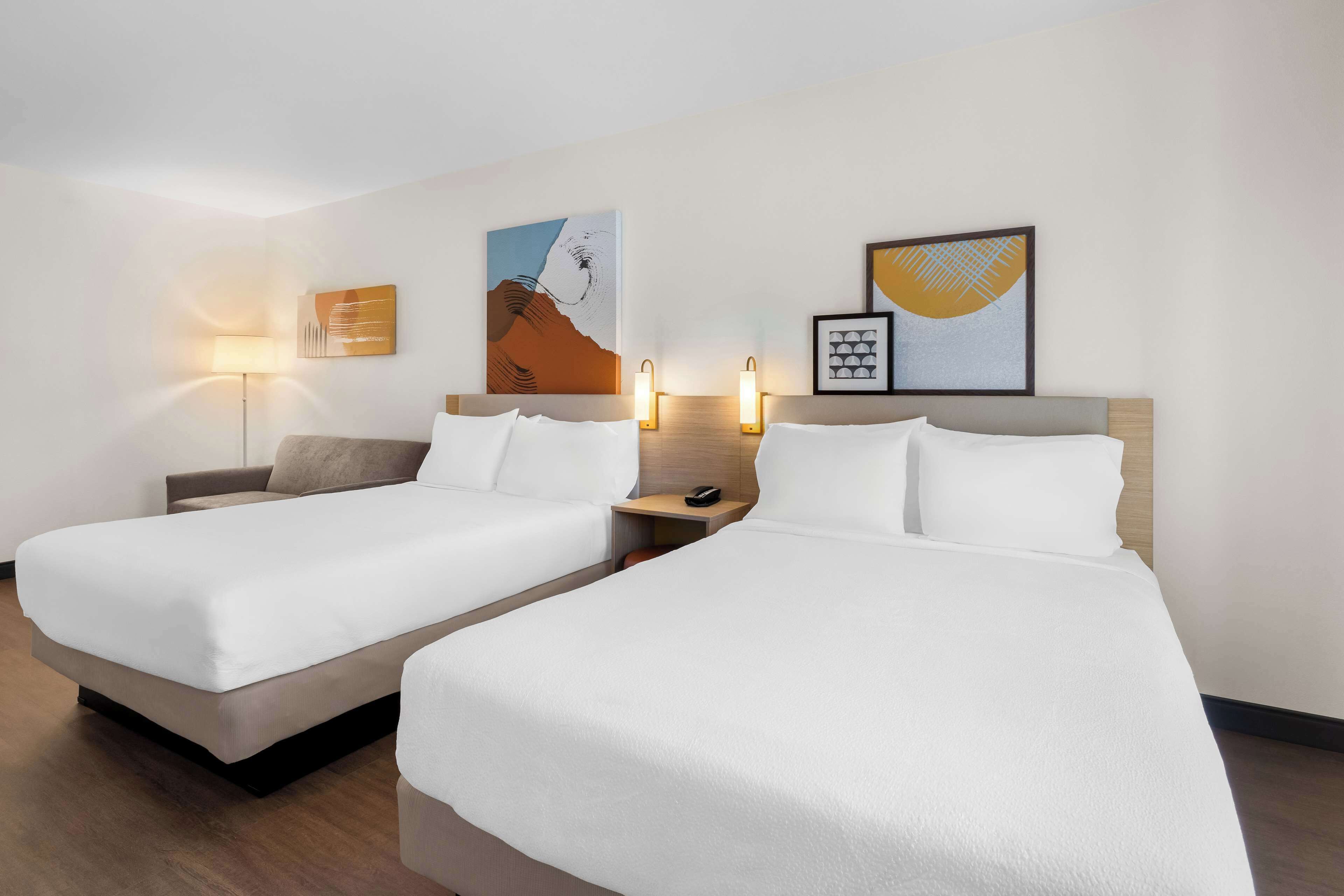 room, multiple beds | desk, laptop workspace, blackout curtains, iron/ironing board