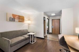 Room, 1 King Bed with Sofa bed | Living area | Flat-screen TV