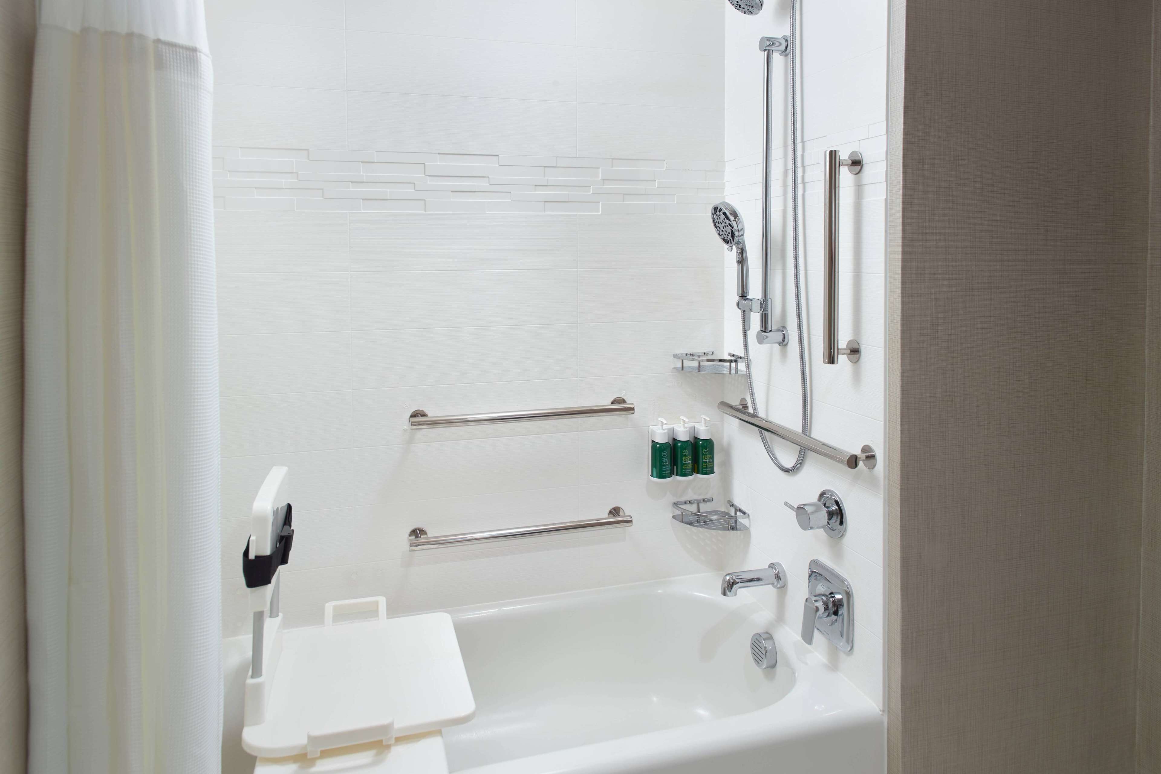 suite, multiple beds, accessible (mobility two bedroom roll in shower) | bathroom | combined shower/bathtub, hair dryer, towels, soap