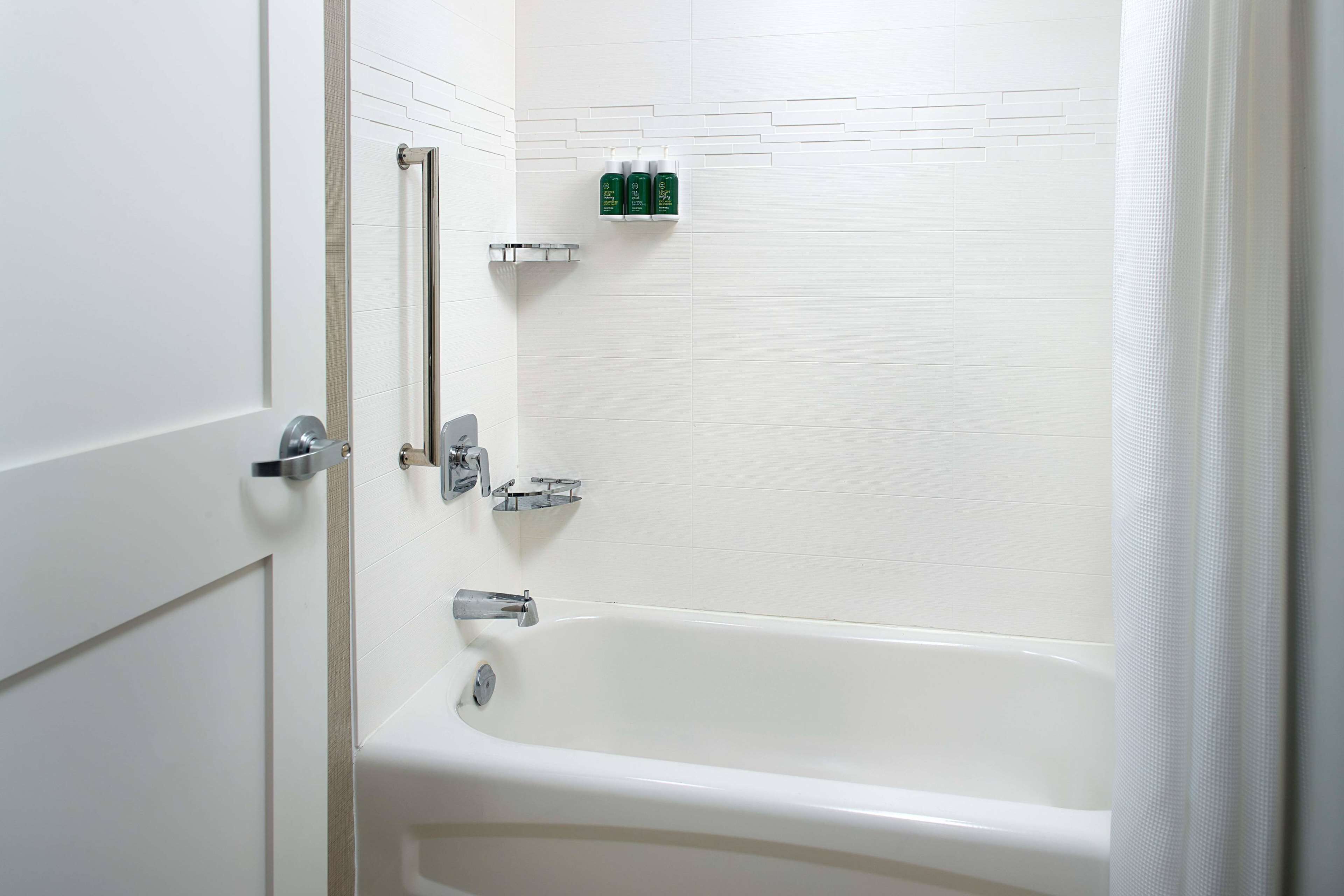 combined shower/bathtub, hair dryer, towels, soap