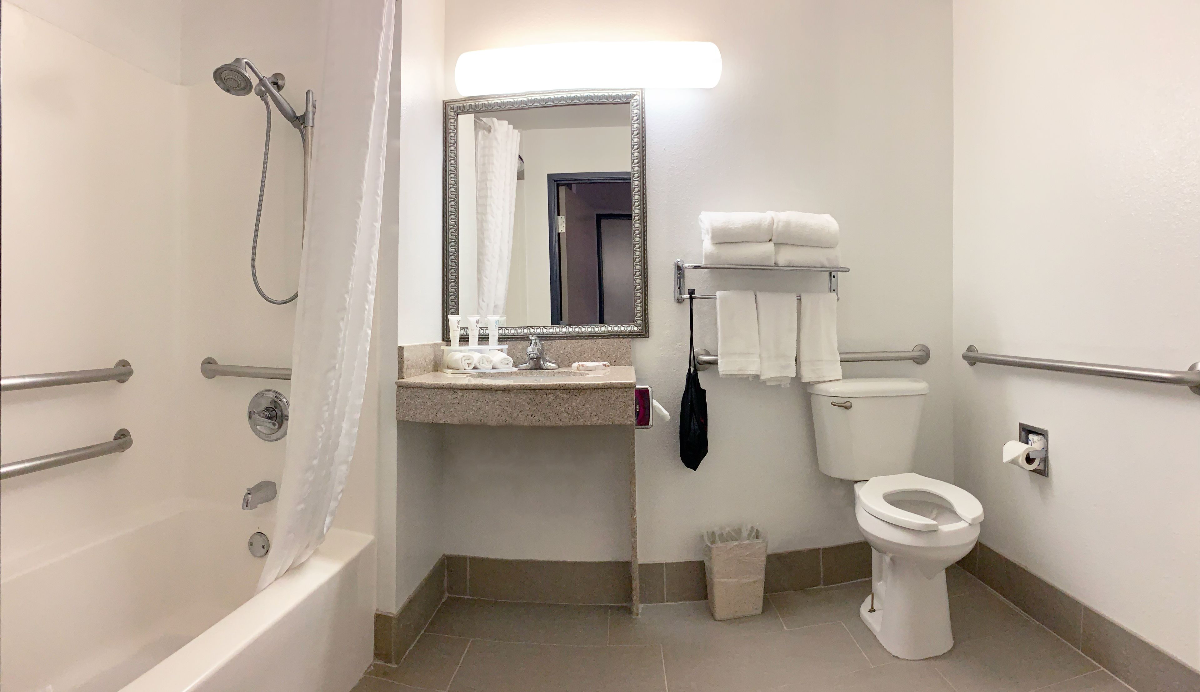 desk, laptop workspace, blackout curtains, iron/ironing board