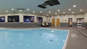 An indoor swimming pool with clear lane markings, a tiled floor, and a ceiling with recessed lighting. - Holiday Inn Express Hotel & Suites Colby by IHG (Colby)