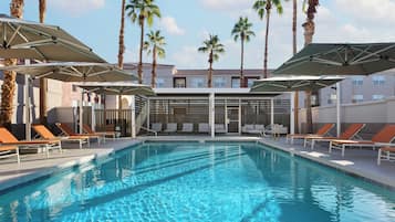 Outdoor pool, open 8:00 AM to 11:00 PM, pool umbrellas, pool loungers