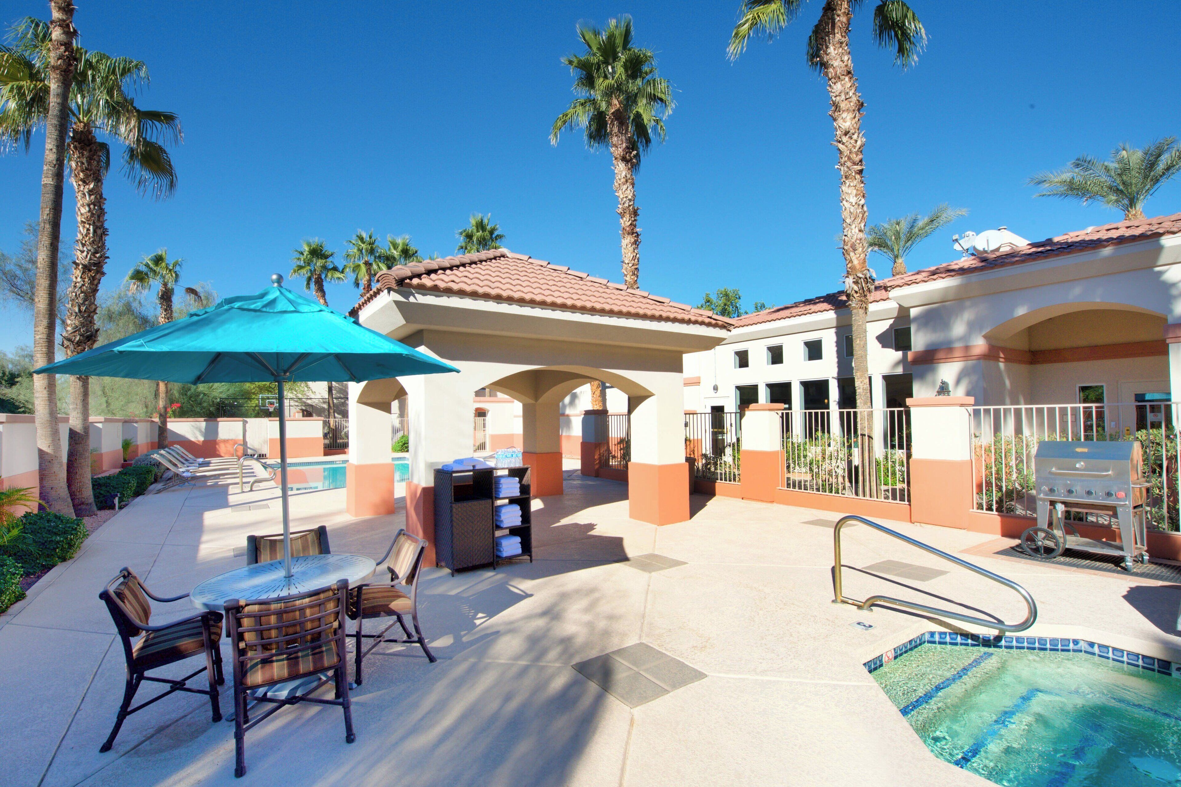 outdoor pool, open 8:00 am to 11:00 pm, pool umbrellas, pool loungers