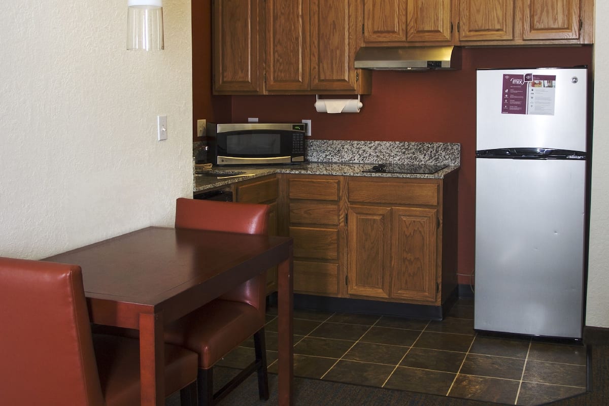 premium bedding, desk, laptop workspace, blackout curtains