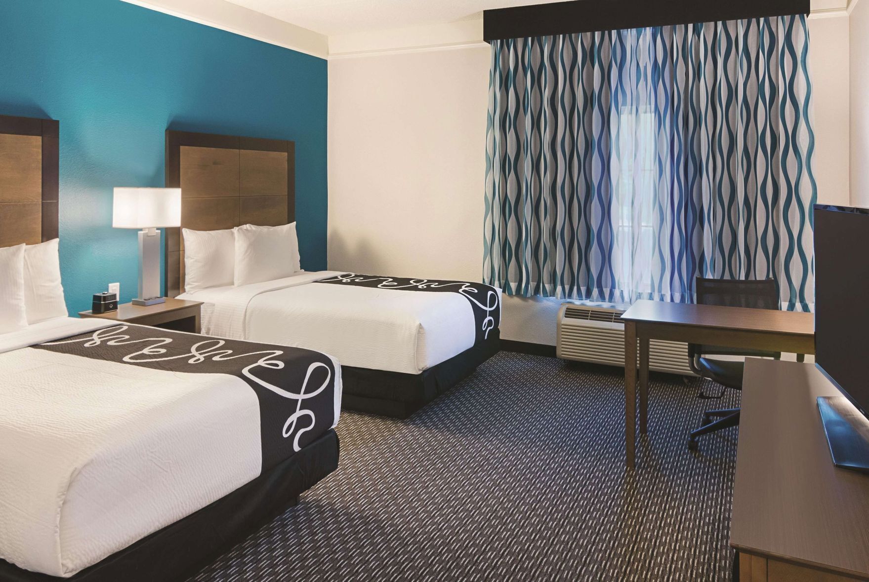 Premium bedding, down comforters, pillowtop beds, desk
