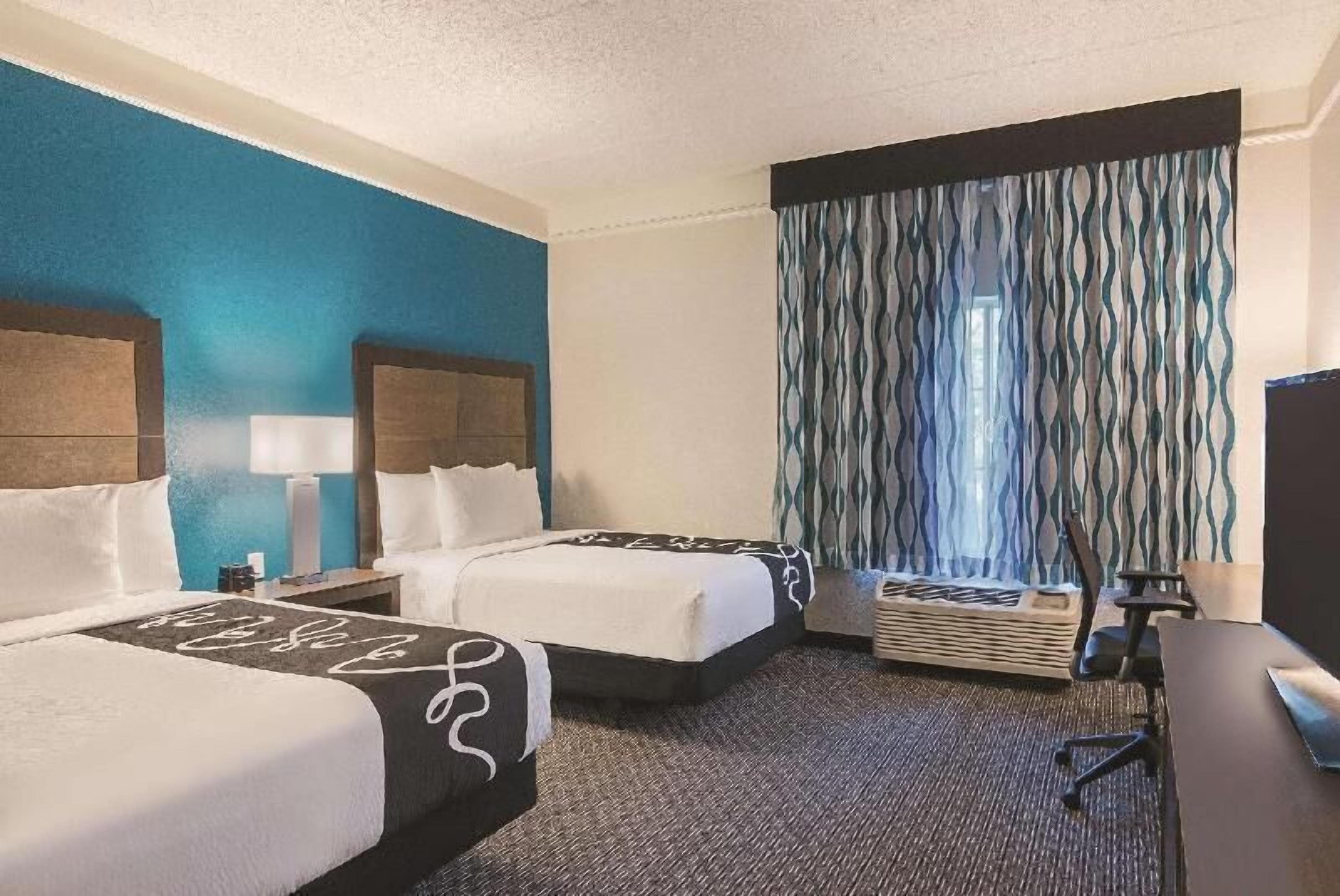 Premium bedding, down comforters, pillowtop beds, desk