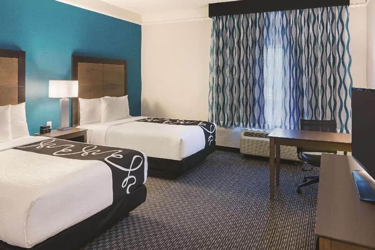 Premium bedding, down comforters, pillowtop beds, desk