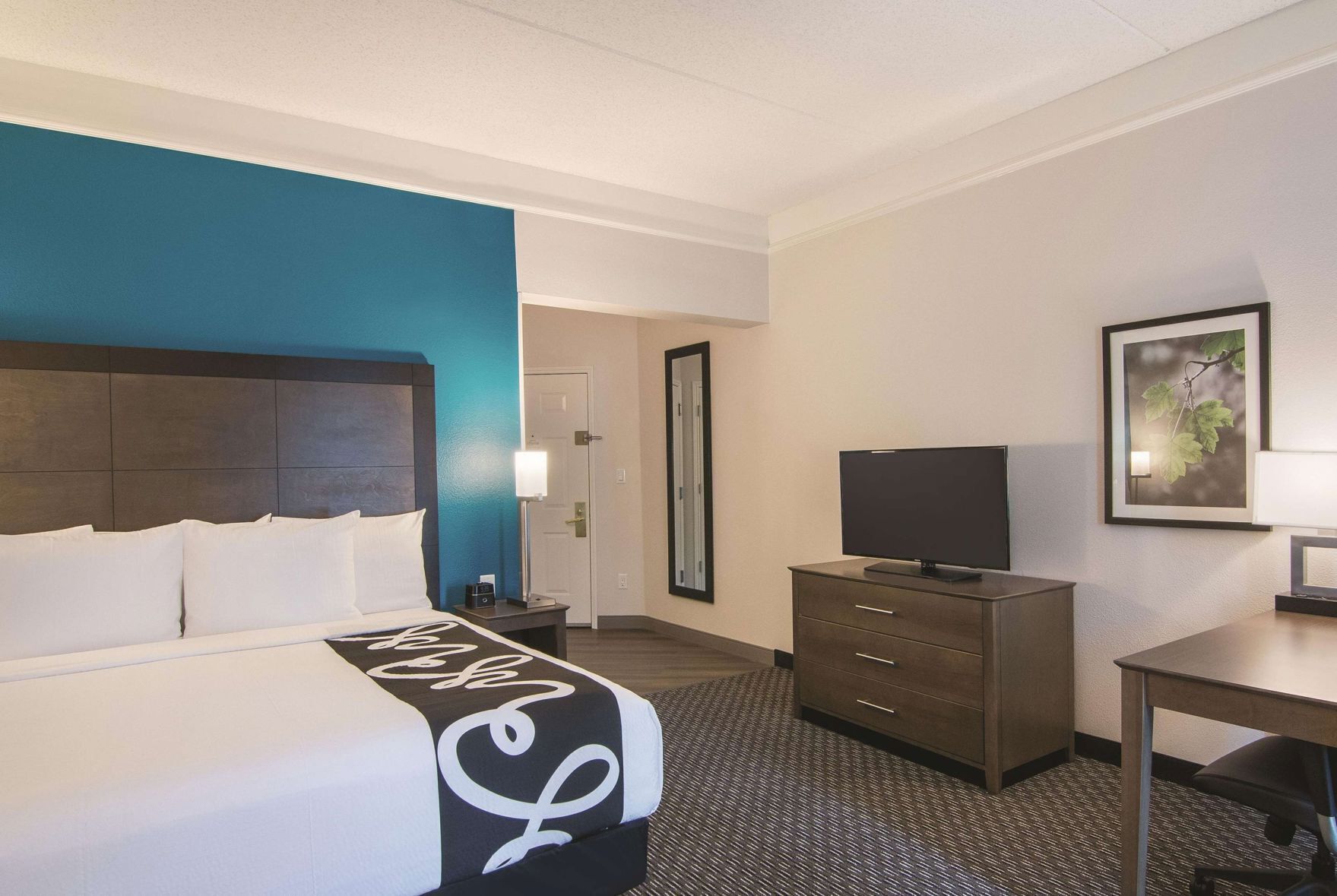 Premium bedding, down comforters, pillowtop beds, desk