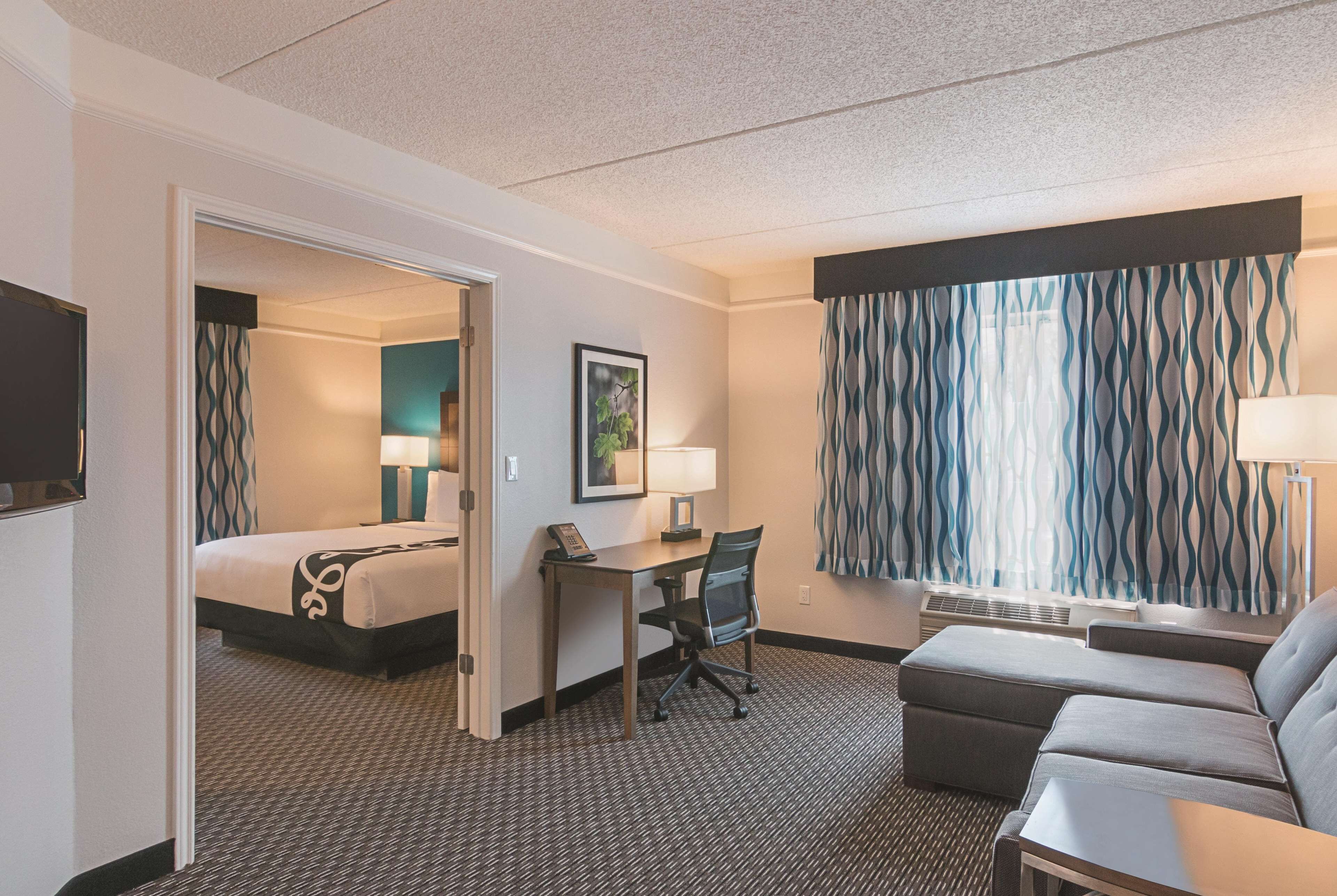 Deluxe Suite, 1 King Bed, Non Smoking, Pool View | Premium bedding, down duvets, pillow-top beds, desk