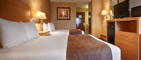 Desk, laptop workspace, iron/ironing board, free cribs/infant beds