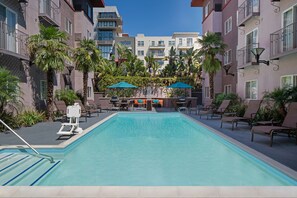 Outdoor pool, open 8 AM to 10 PM, pool umbrellas, sun loungers