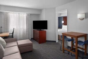 32-inch flat-screen TV with cable channels, TV