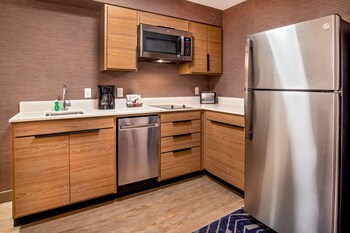 Full-size fridge, microwave, stovetop, dishwasher at Residence Inn by Marriott Boston Cambridge