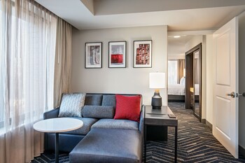 Premium bedding, desk, laptop workspace, blackout drapes at Residence Inn by Marriott Boston Cambridge