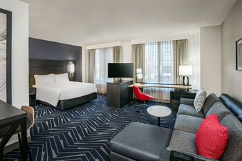Premium bedding, desk, laptop workspace, blackout drapes at Residence Inn by Marriott Boston Cambridge