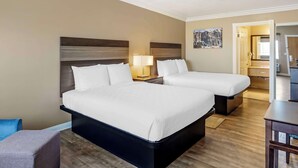 A hotel room with two beds, a desk, and a chair. - Best Western China Lake Inn (Ridgecrest)