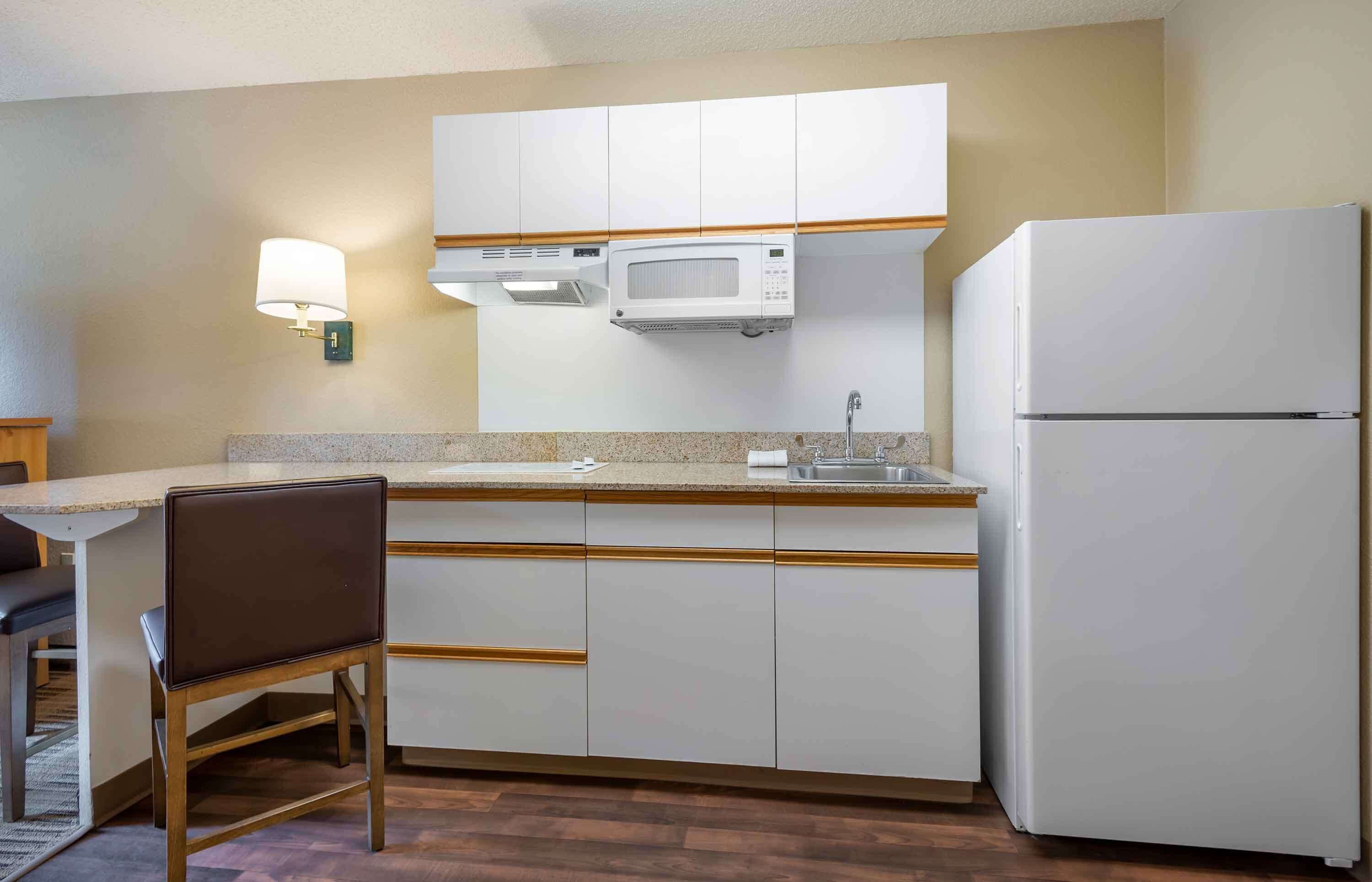 Studio, 1 Queen Bed, Non Smoking | Private kitchen | Full-size fridge, microwave, stovetop, coffee/tea maker