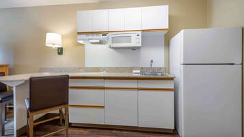 Studio, 1 Queen Bed, Non Smoking | Private kitchen | Full-size fridge, microwave, stovetop, coffee/tea maker