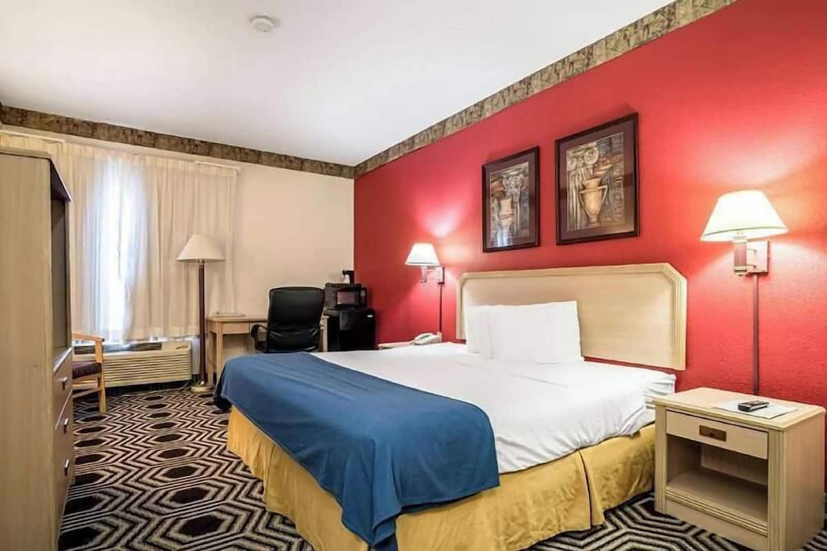 Desk, blackout drapes, iron/ironing board, free cribs/infant beds