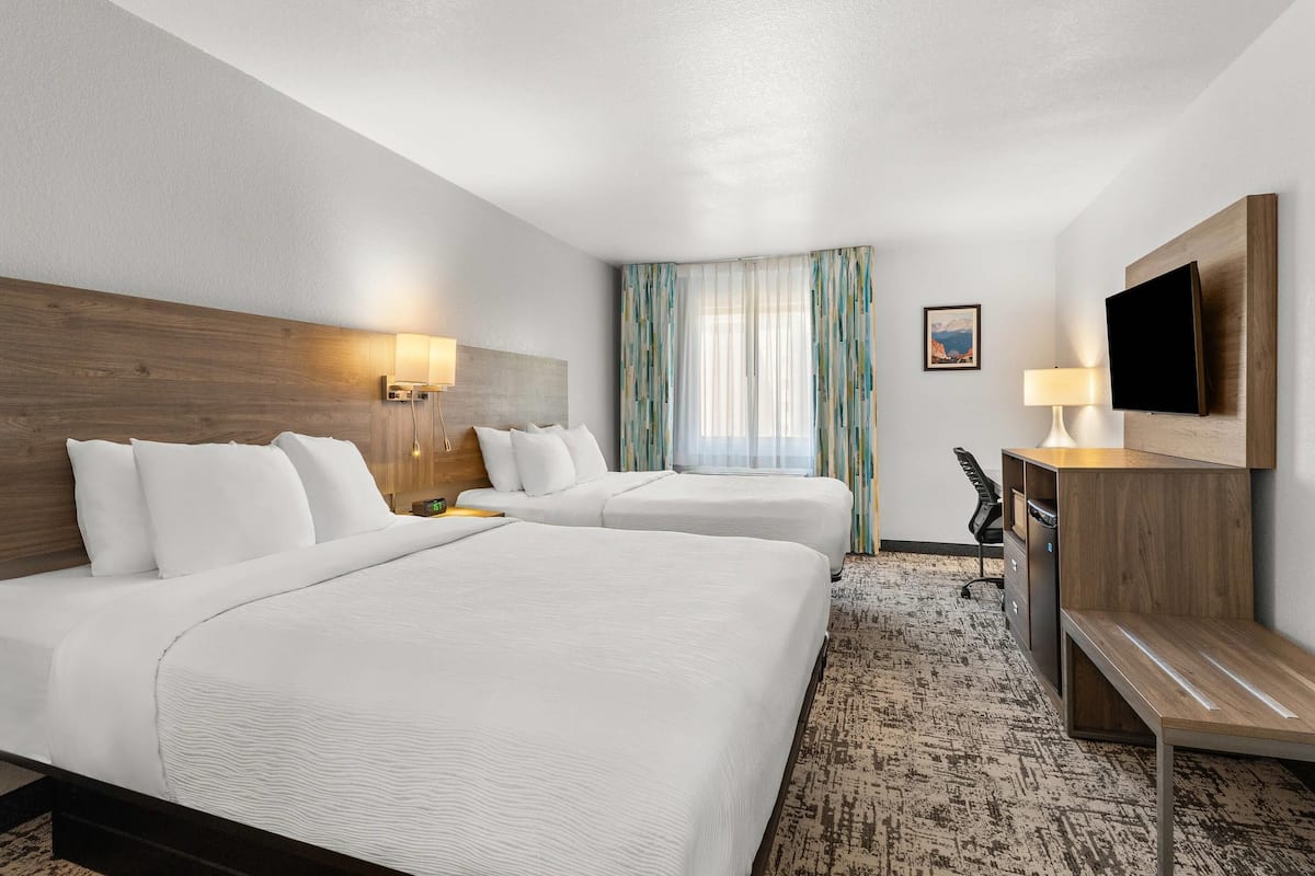 Pillowtop beds, desk, laptop workspace, blackout drapes