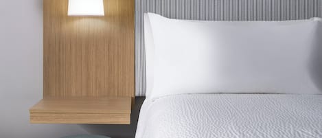 Pillowtop beds, desk, laptop workspace, blackout drapes