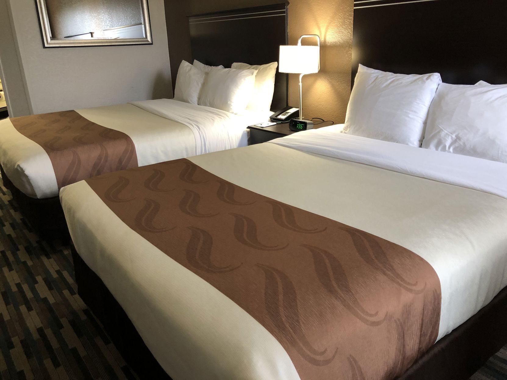 Pillowtop beds, desk, laptop workspace, blackout drapes