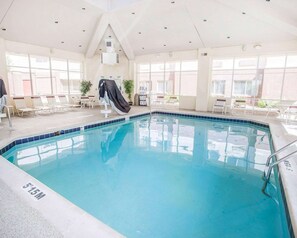 Indoor pool, open 9:00 AM to 10:00 PM, pool loungers