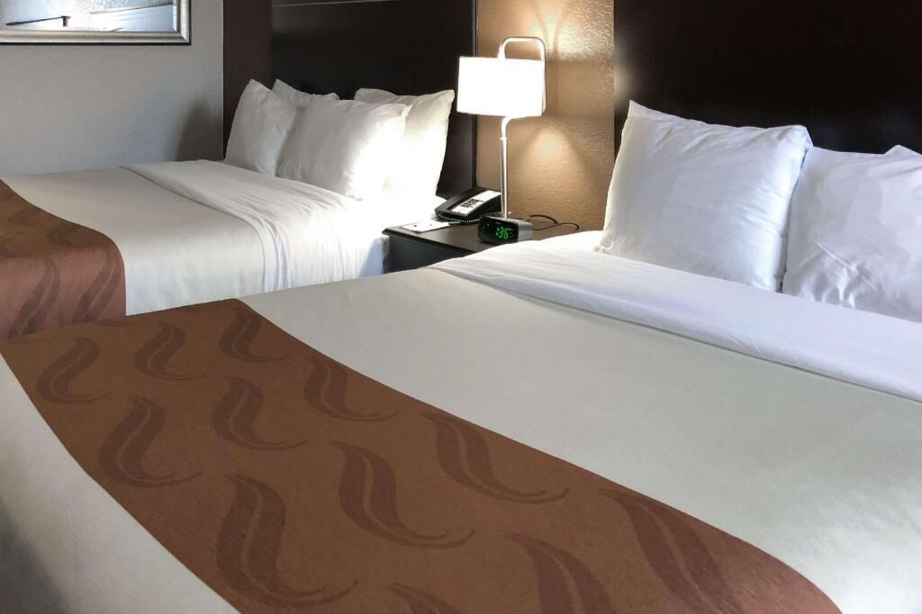 Pillowtop beds, desk, laptop workspace, blackout drapes