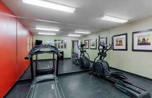 A gym with treadmills, elliptical machines, and stationary bikes. - Extended Stay America Select Suites Dallas Farmers Branch (Dallas)