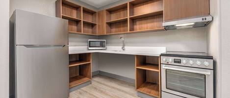 Full-sized fridge, microwave, stovetop