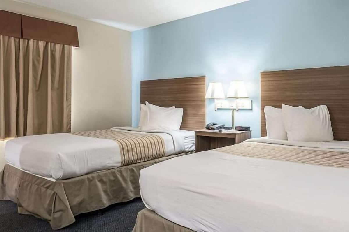 Pillow-top beds, blackout curtains, iron/ironing board, free WiFi