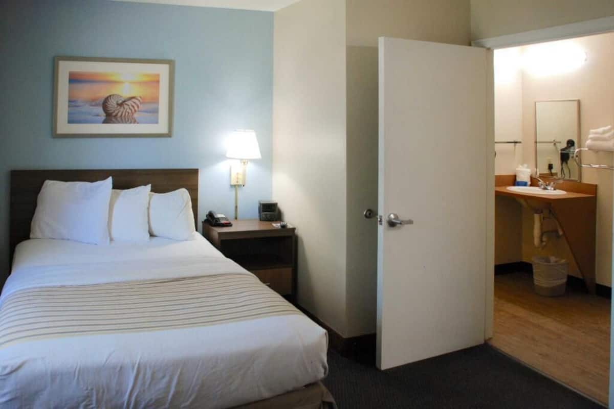 Pillow-top beds, blackout curtains, iron/ironing board, free WiFi